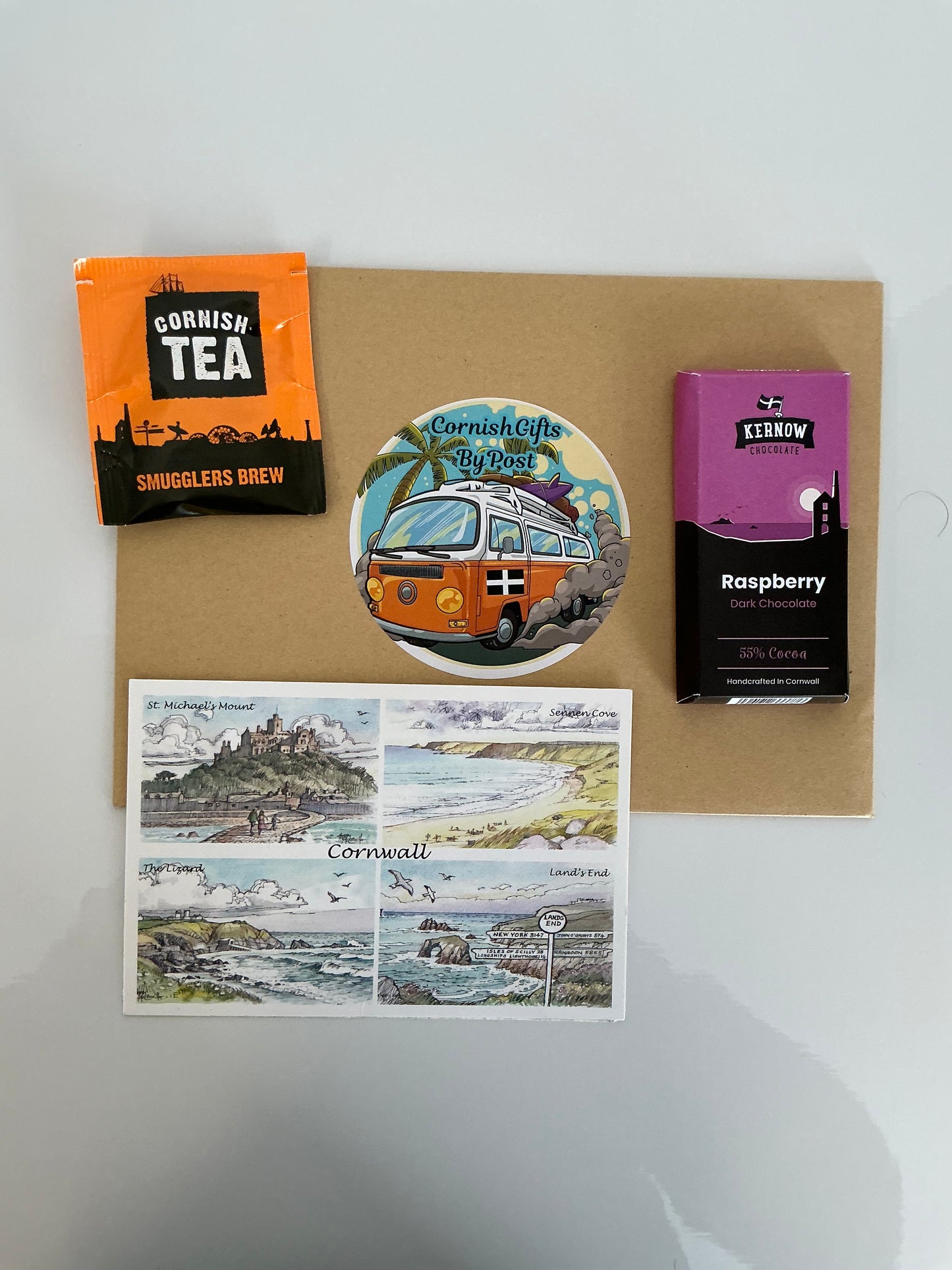 Raspberry dark chocolate mini bar with tea or coffee and a personalised Cornwall postcard