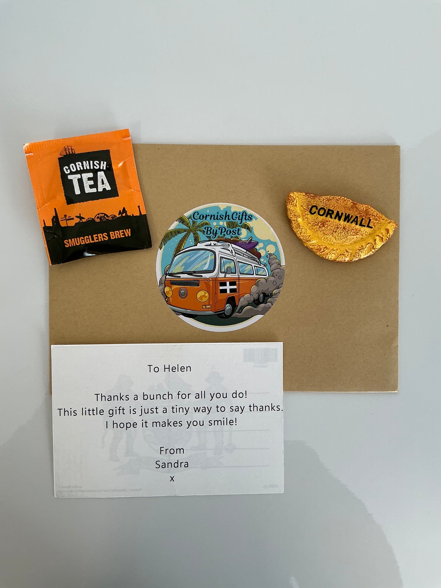 Gift a fridge magnet with a personalised Cornwall postcard with a cup of tea or coffee, choose from 12 Cornwall styles fridge magnets