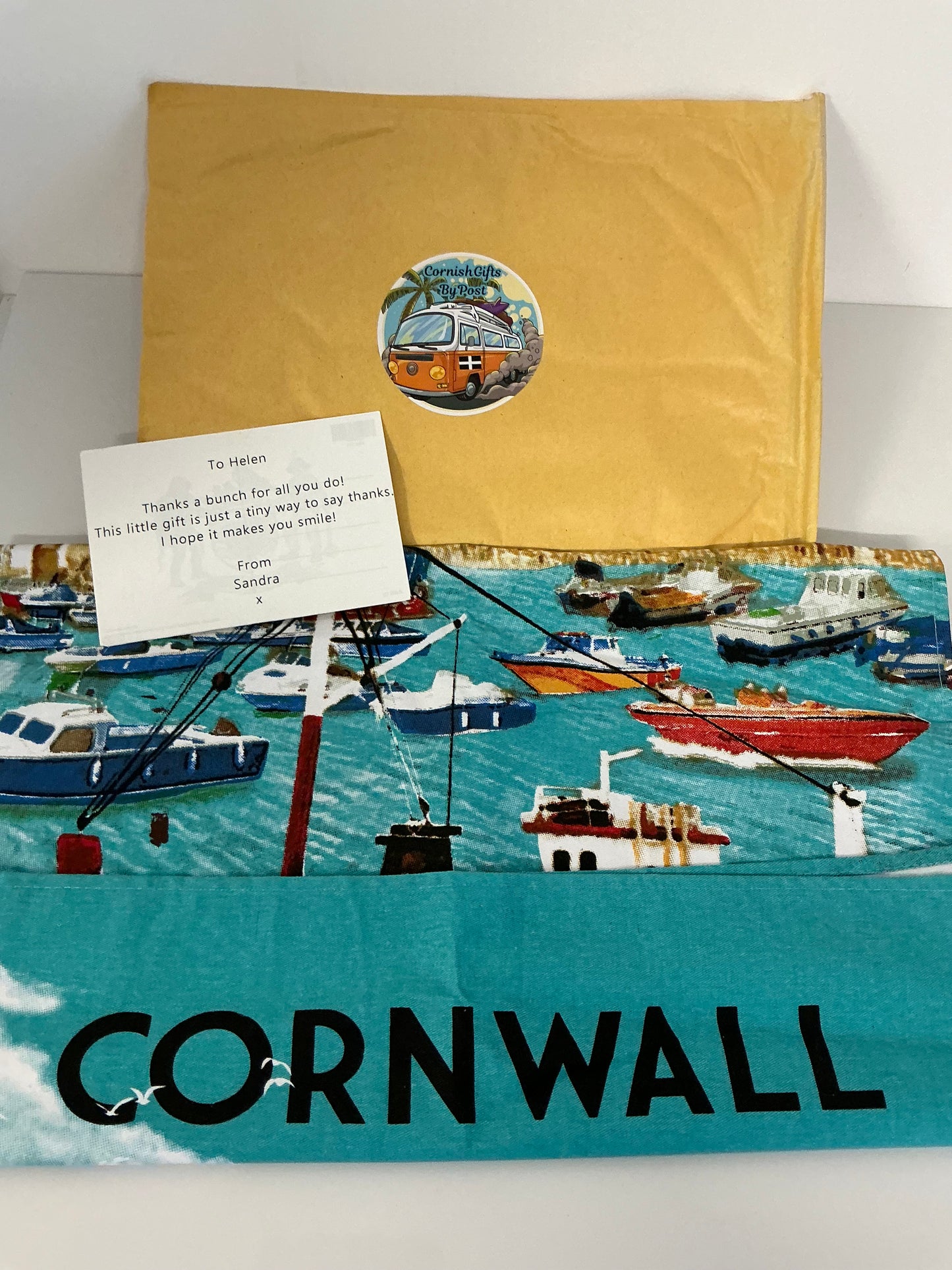 Cornwall tea towel with a personalised Cornwall postcard
