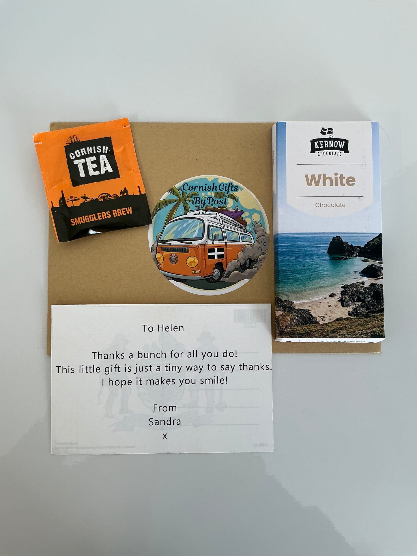 White chocolate with tea or coffee and a personalised Cornwall postcard