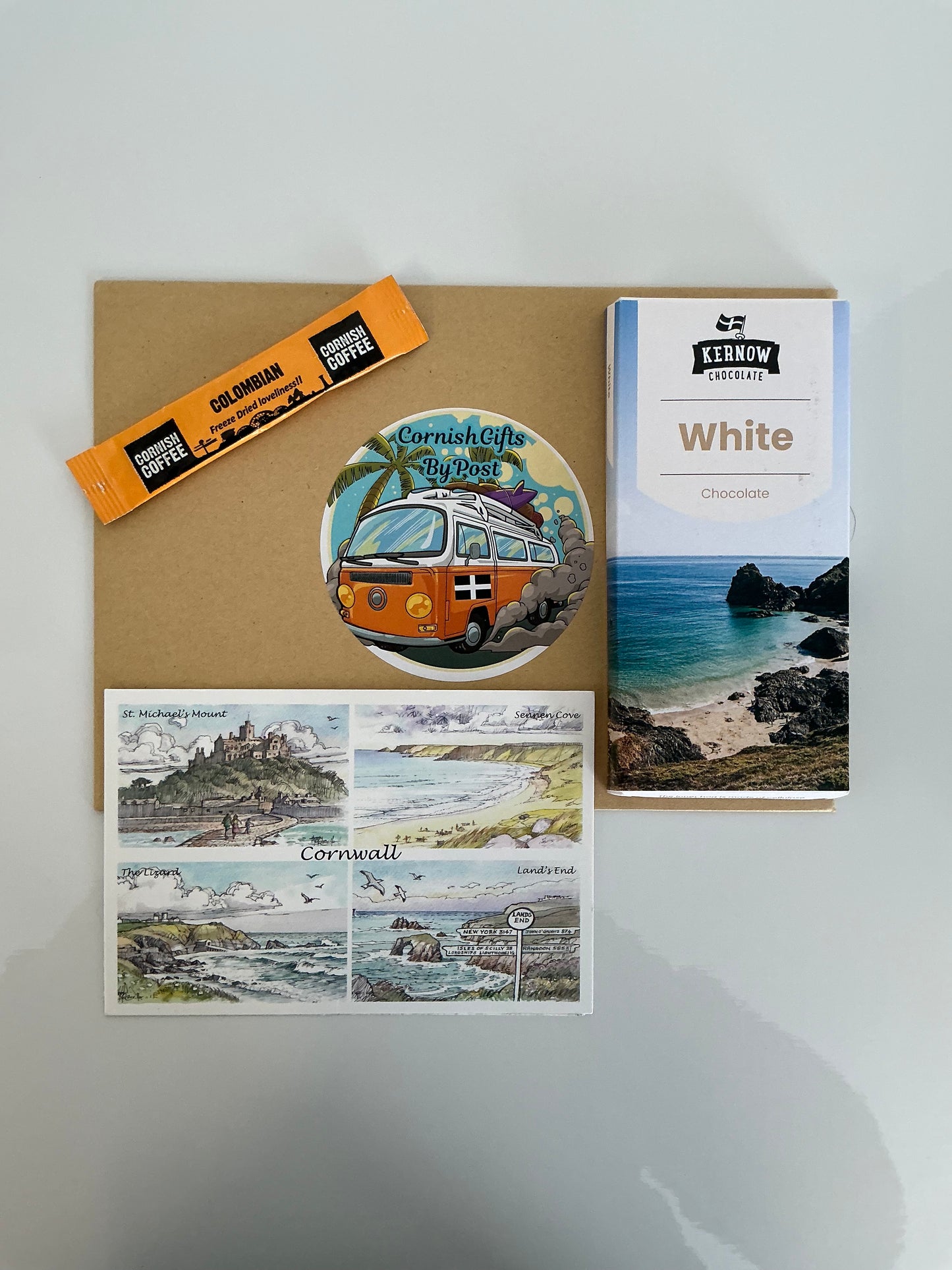White chocolate with tea or coffee and a personalised Cornwall postcard