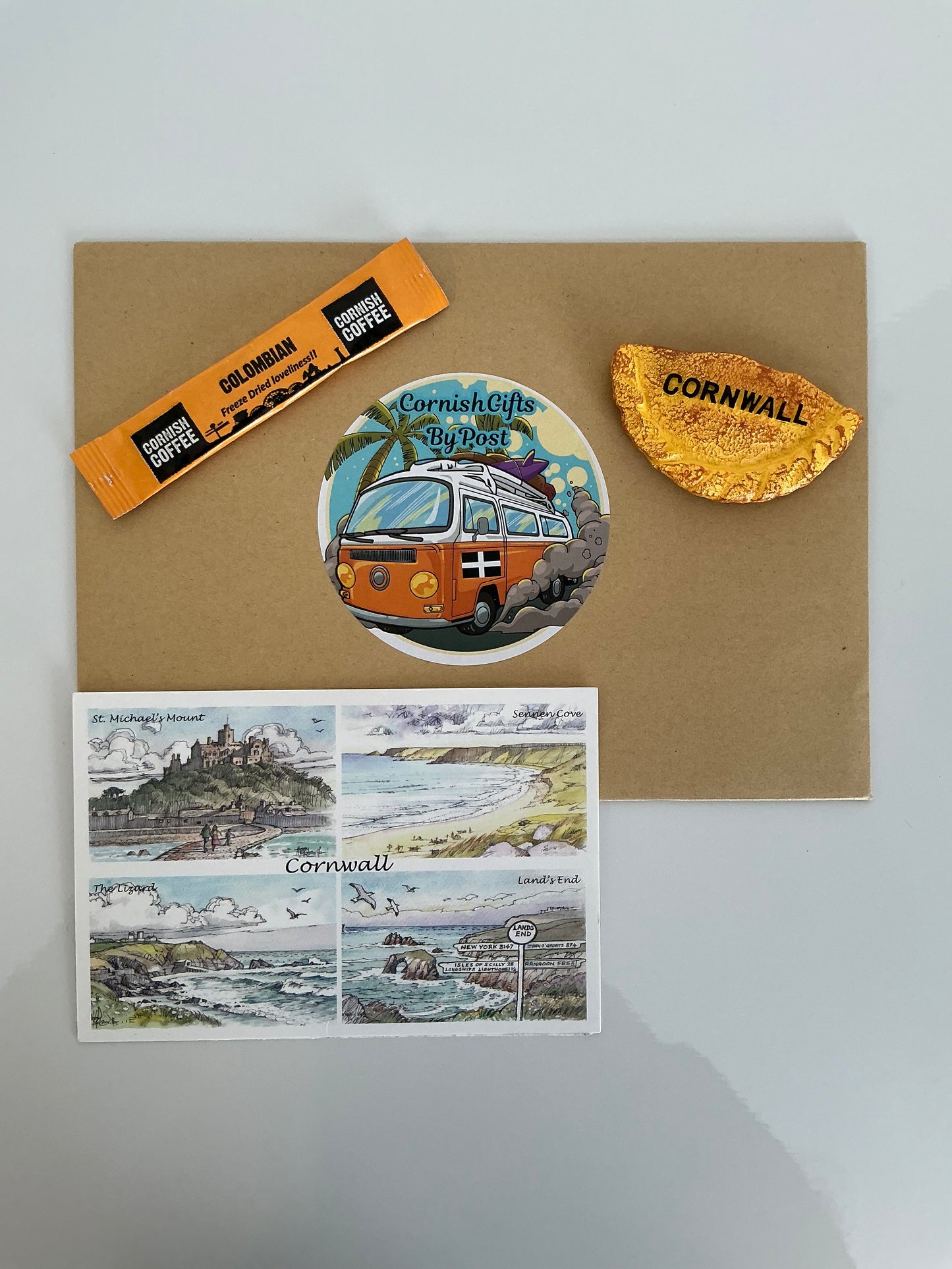 Gift a fridge magnet with a personalised Cornwall postcard with a cup of tea or coffee, choose from 12 Cornwall styles fridge magnets