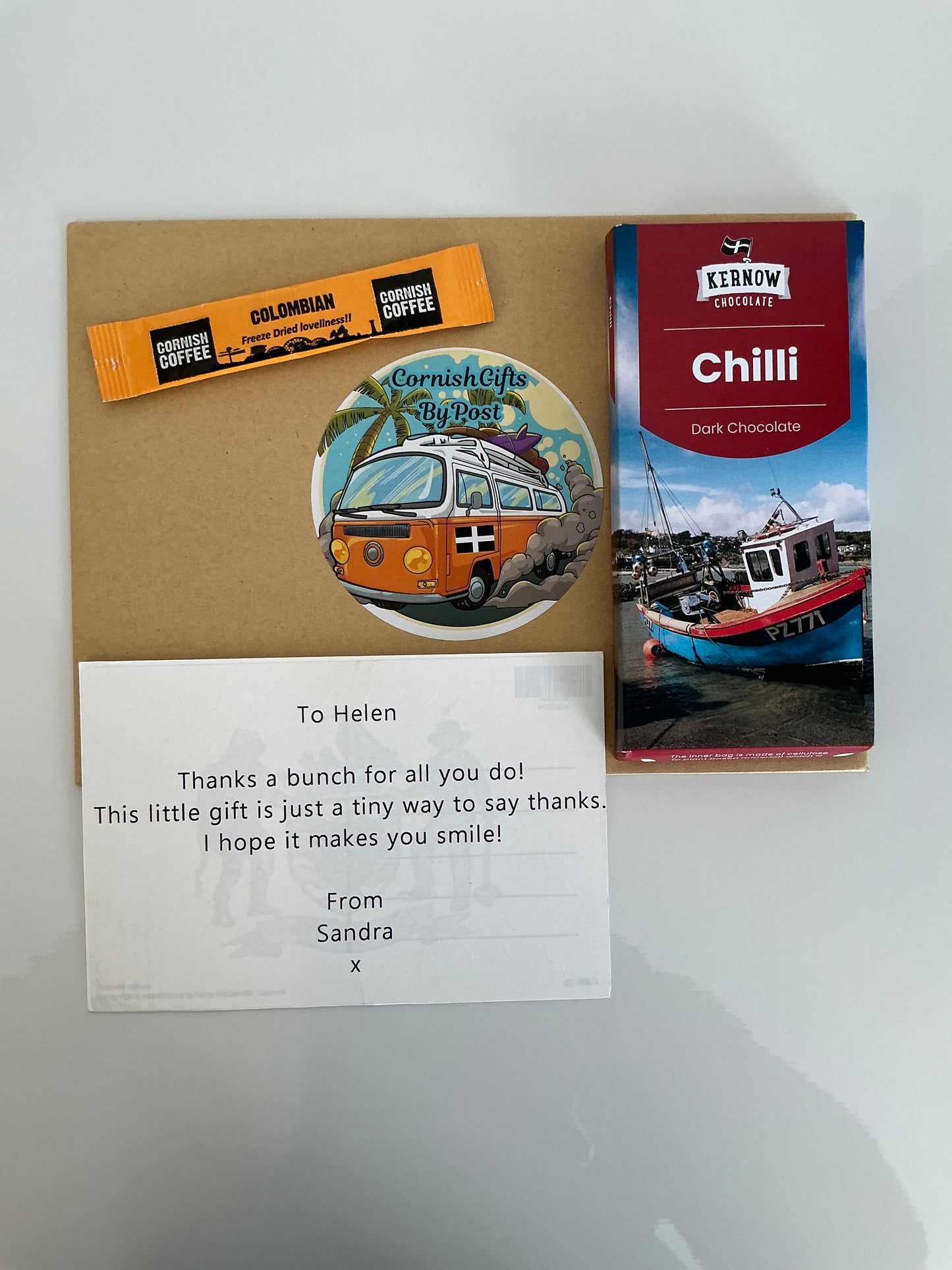 Chilli dark chocolate with tea or coffee and a personalised Cornwall postcard