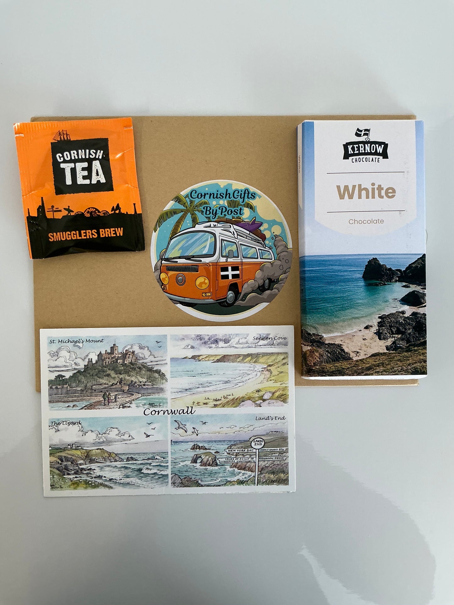 White chocolate with tea or coffee and a personalised Cornwall postcard